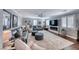 Comfortable living room featuring neutral walls, fireplace, and large windows with shutters at 3809 Vincelli Ave, North Las Vegas, NV 89031