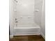 A bathroom featuring a shower-tub combo with white tiles at 3829 Soda Springs Dr, Las Vegas, NV 89115
