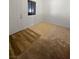 Vacant Living room featuring new flooring and carpet, a window with security bars, and a neutral color scheme at 3829 Soda Springs Dr, Las Vegas, NV 89115