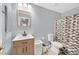 Bathroom featuring a shower with curtain, toilet and vanity at 3920 Sweet Pine St # 102, Las Vegas, NV 89108