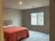 Bedroom with a window view of distant hills providing ample natural light at 4243 Sago Lily St, Las Vegas, NV 89129