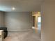 Open loft area with neutral walls and carpet, ideal for flexible living at 4243 Sago Lily St, Las Vegas, NV 89129