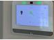 Smart home thermostat with settings for porch light, door lock, and temperature at 4243 Sago Lily St, Las Vegas, NV 89129