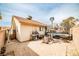 The private backyard offers low maintenance landscaping, paver patio, and is perfect for outdoor entertaining at 4438 Faberge Ave, Las Vegas, NV 89115