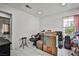 The bonus room has tile flooring, ample natural light, and is ready for storage or hobbies at 4438 Faberge Ave, Las Vegas, NV 89115