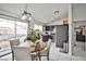 Dining area featuring a dining table set with seating, access to the backyard, and stainless steel appliances at 4438 Faberge Ave, Las Vegas, NV 89115