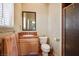 Bathroom with a vanity, toilet, and shower with tile surround at 4574 Sheri Lyn Ct, Las Vegas, NV 89121