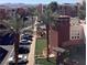 A charming community area with palm trees and lush landscaping between the buildings for a welcoming and relaxing atmosphere at 51 E Agate Ave # 507, Las Vegas, NV 89123