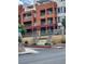 A lovely view of the condo building from street level highlighting Park Avenue Condominiums entrance and upper-level balconies at 51 E Agate Ave # 507, Las Vegas, NV 89123