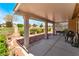 Enjoy the outdoor living space of this covered patio with views of the landscaped yard at 5433 Honey Mesquite Ln, Las Vegas, NV 89130