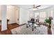 Inviting living room with hardwood floors, natural light, and comfortable seating at 5433 Honey Mesquite Ln, Las Vegas, NV 89130