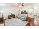 Spacious living room featuring hardwood floors and comfortable seating area at 5433 Honey Mesquite Ln, Las Vegas, NV 89130