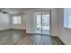 Bright living space featuring modern flooring, a sliding glass door leading to a patio, and recessed lighting at 5730 Sky Pointe Dr # 165, Las Vegas, NV 89130