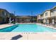 Community pool and lounging area offers residents a space to relax and enjoy the outdoors at 5730 Sky Pointe Dr # 165, Las Vegas, NV 89130
