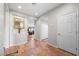 Spacious entryway boasts tile flooring, neutral paint, and seamless transition to living areas at 6022 Quintillion Ave, Las Vegas, NV 89122