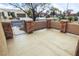 Charming front porch with stone accents and wrought iron gate leads to inviting residence at 6022 Quintillion Ave, Las Vegas, NV 89122