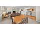 Open-concept living area with seamless flow between living, dining, and kitchen spaces at 6022 Quintillion Ave, Las Vegas, NV 89122