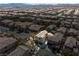 Aerial view of a residential neighborhood featuring well-maintained homes and manicured landscaping at 6653 Ashley House Ct, Las Vegas, NV 89139