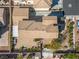 Aerial view of a house showing the roof, patio, and backyard with some landscaping at 6653 Ashley House Ct, Las Vegas, NV 89139
