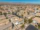 Scenic aerial view of a neighborhood with mountains in the background at 6653 Ashley House Ct, Las Vegas, NV 89139