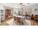 Elegant dining room with ample natural light and classic furniture at 6653 Ashley House Ct, Las Vegas, NV 89139