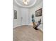 Inviting entryway with wood-look tile flooring and stylish decor at 69 Via Di Mello, Henderson, NV 89011