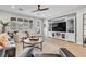 Bright living room featuring hardwood floors and a built-in media center at 69 Via Di Mello, Henderson, NV 89011