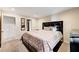 Comfortable bedroom featuring neutral walls, carpet and ample closet space at 7341 Girard Dr, Las Vegas, NV 89147