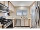 This kitchen boasts modern appliances and plenty of counter space, perfect for cooking at 7341 Girard Dr, Las Vegas, NV 89147