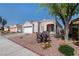 Charming single story home with two car garage and desert landscaping at 7828 Morning Flower Ln, Las Vegas, NV 89129