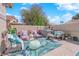 A cozy backyard lounge area with comfortable seating is perfect for outdoor gatherings at 7845 Scammons Bay Ct, Las Vegas, NV 89129