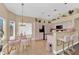 Bright eat-in kitchen area featuring modern appliances, stylish seating, and plenty of counter space at 7845 Scammons Bay Ct, Las Vegas, NV 89129