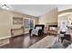 Bright living room boasts hardwood floors, a modern fireplace, and stylish seating, perfect for entertaining at 7845 Scammons Bay Ct, Las Vegas, NV 89129