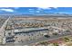Wide shot of a shopping center with surrounding buildings at 7950 W Flamingo Rd # 1044, Las Vegas, NV 89147