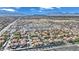 Aerial view of a neighborhood with uniform single Gathering homes and condos at 7950 W Flamingo Rd # 1044, Las Vegas, NV 89147