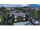 Aerial view of a well-maintained condo complex with mature trees and mountain views at 7950 W Flamingo Rd # 1044, Las Vegas, NV 89147