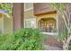 Exterior view of a balcony with sliding glass door and well-maintained landscaping at 7950 W Flamingo Rd # 1044, Las Vegas, NV 89147