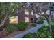 Charming two-story home with lush landscaping and inviting entrance at 7950 W Flamingo Rd # 1044, Las Vegas, NV 89147
