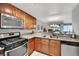 Functional kitchen featuring stainless steel appliances and a double sink at 7950 W Flamingo Rd # 1044, Las Vegas, NV 89147
