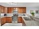 Bright kitchen with granite countertops, stainless steel appliances, and ample storage space at 7950 W Flamingo Rd # 1044, Las Vegas, NV 89147
