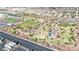 Aerial view of a park featuring sports fields, walking paths, and shaded picnic areas at 7950 W Flamingo Rd # 1044, Las Vegas, NV 89147