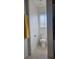 A half-bathroom featuring a toilet and a window, efficiently utilizing a compact space at 8117 Discovery Point St, Las Vegas, NV 89139