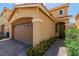 Two-story home with desert landscaping, tile roof, and a two-car garage at 8117 Discovery Point St, Las Vegas, NV 89139