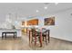 Eat in kitchen with oak cabinets, granite counters, stainless appliances and bright recessed lighting at 8117 Discovery Point St, Las Vegas, NV 89139