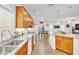 Bright kitchen with a large window, granite countertops, and stainless steel sink at 8117 Discovery Point St, Las Vegas, NV 89139