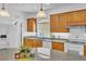 Well-lit kitchen with granite countertops, stainless appliances, and ample cabinet space at 8117 Discovery Point St, Las Vegas, NV 89139