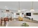 Open-concept living room features a dining area and a comfortable seating arrangement at 8117 Discovery Point St, Las Vegas, NV 89139