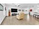 Expansive open floor plan with light colored tile, recessed lights, and neutral walls at 8117 Discovery Point St, Las Vegas, NV 89139