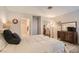 Relaxing bedroom with a view into the bathroom and plenty of room for dresser and television at 8628 Desert Holly Dr, Las Vegas, NV 89134
