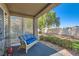 Charming covered patio with comfortable seating and well-maintained garden at 8628 Desert Holly Dr, Las Vegas, NV 89134